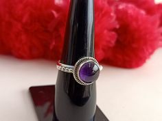 Handmade Amethyst silver ring , you can wear this ring as a party wear ring .. Title - Amethyst silver ring Stone color - purple Stone shape - round Material - Sterling silver 925 Note - We use natural gemstones, so color shade may be little bit different .. we are giving you best quality rings on best price .. contact us for more quantity Adjustable Round Ruby Ring Stamped 925, Bohemian Amethyst Sterling Silver Ring, Bohemian Purple Round Rings, Adjustable Amethyst Ring With Stone Setting, Purple Stone Ring, Quality Rings, Purple Stone Rings, Ring Purple, Green Stone Rings