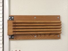 an old fashion design diy project with clothes drying rack and wooden utensils