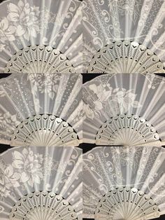 an image of white lace fan pattern on black and white background for use as wallpaper