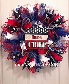 a red, white and blue wreath with the words home of the brave on it