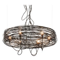 a chandelier made out of wire with lights hanging from the top and bottom