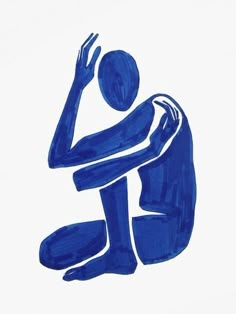 a blue drawing of a person sitting on the ground