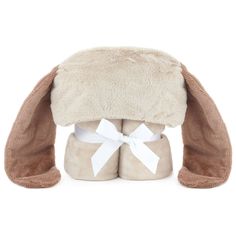 a stuffed animal with a bow on it's head and booties in the shape of a bunny