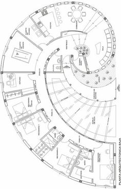 the floor plan for an office building with spiral staircases and circular rooms, which are connected