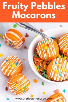 fruity pebbles macarons with white frosting and sprinkles in a bowl