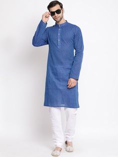 VASTRAMAY Men's Blue Pure Cotton Kurta Look effortlessly stylish in this comfortable blue kurta from VASTRAMAY. Made from 100% pure cotton, this kurta is breathable and perfect for everyday wear. It features a classic design with a mandarin collar and a button placket down the front. Key Features Made from 100% pure cotton for ultimate comfort Classic design for timeless style Mandarin collar for a sophisticated look Button placket for easy wear Specifications Sleeve Length - Long Sleeves Top Sh Blue Kurta, Cotton Kurta, Sleeves Top, Packaging Labels, Product Images, Mandarin Collar, Easy Wear, Button Placket, Timeless Style