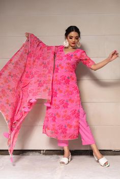 Prepare to get overwhelmed with a swirl of compliments by dressing yourself in this beautiful Printed chiffon kurta suit set. With chiffon floral print dupatta and straight silhouette, Pair it with beautiful statement earrings and traditional juttis. SKU#: 11403216PK Disclaimer: There may be slight difference in actual product color compared to product images. Floral Print Chiffon Sets, Elegant Georgette Sharara With Printed Motifs, Elegant Floral Print Georgette Sharara, Elegant Floral Print Chanderi Sets, Summer Lawn Suit With Sheer Dupatta, Elegant Floral Print Salwar Kameez For Diwali, Elegant Chanderi Salwar Kameez With Floral Print, Spring Pink Kurta With Sheer Dupatta, Summer Festive Georgette Palazzo Set