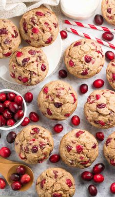 cranberry chocolate chip cookies on a table with candy canes