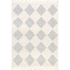 a white and grey rug with diamonds on it