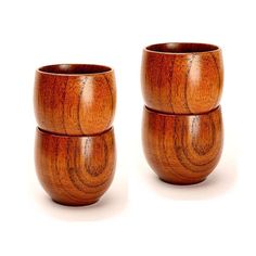 three wooden cups sitting next to each other