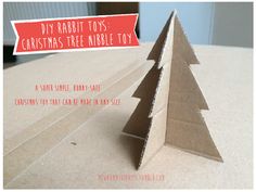 an origami christmas tree made out of cardboard with text overlay that reads diy rabbit toys christmas tree noble toy