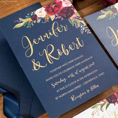 the wedding stationery was done in navy blue with gold foil lettering and floral designs