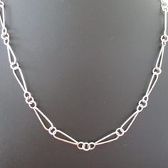 This Chains item by sherrybsilverstudio has 2 favorites from Etsy shoppers. Ships from Allentown, PA. Listed on Aug 26, 2024 Handmade Chains Jewelry, Sterling Silver Link Chain Necklace, Handmade Chain Jewelry, Silver Soldering, Handmade Chains, Handmade Silver Chain, Chain Types, Chain Link Necklace Silver, Contemporary Jewellery Designers