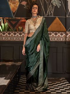 Celebrate your upcoming festivals, events, and any occasion with our mesmerizing green weaving silk saree with blouse. This stunning ensemble features intricate weaving work on the silk fabric, giving you a chic and elegant look. The saree comes in a beautiful green color, while the cream color art silk blouse complements the saree perfectly with its zari weaving work.
The saree measures 5.50 meters, providing you with ample fabric to drape and style in different ways. The unstitched blouse mate Green Weaving, Drapping Saree, Cream Silk Blouse, Patiala Salwar, Cream Blouse, Half Sleeve Blouse, Green Saree, Party Kleidung, Stylish Sarees