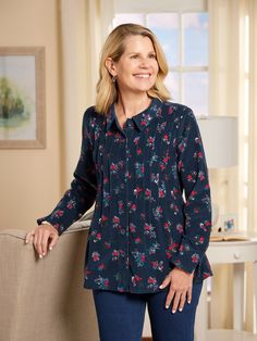 Enjoy the elevated styling of our classic plush corduroy tunic in a rich navy and red floral that's festive enough for entertaining and casual enough for everyday wear. Pintucking runs three-quarters of the way down the full-button front and adds feminine flair. Plush, velvety corduroy Easy-fitting style Festive navy and red floral Full-button front Pintucking details Approx. 27" long Machine wash and dry Imported Exclusive to The Vermont Country Store | Women's Pintucked Floral Corduroy Tunic Top - Blue - Large - The Vermont Country Store Corduroy Top, Vermont Country Store, Country Store, Red Floral, Tunic Top, Vermont, Three Quarter, Shirts Tops, Everyday Wear