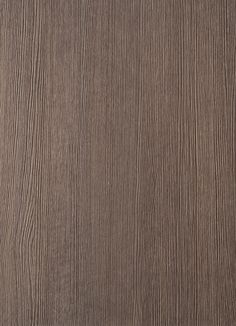 a close up view of the wood grain pattern on this wallpapered paneling