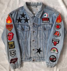 a denim jacket with patches on it