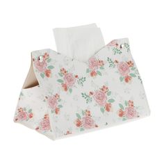 two white napkins with pink roses on them