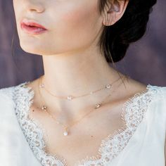 "This beautiful delicate bridal necklace is just divine!  It just sparkles with simple elegance.  Layered and accented with alternating Preciosa clear crystal beads and clear crystal channel chains all hand linked along this delicate chain.  The longer layer has a beautiful 6mm freshwater pearl drop. Finished with a spring ring clasp and available in 2 lengths. To purchase this design as a back necklace visit this listing https://www.etsy.com/ca/listing/573918896/rose-gold-crystal-pearl-layered- Rose Gold Wedding Necklaces With Diamond Accents, Rose Gold Wedding Necklace With Diamond Accents, Rose Gold Diamond Accent Wedding Necklace, Wedding Rose Gold Necklace With Diamond Accents, Elegant White Crystal Necklaces For Wedding, Elegant White Crystal Necklace For Wedding, Elegant Wedding Crystal Necklace With Delicate Chain, Delicate White Backdrop Necklace For Wedding, Delicate Crystal Necklaces For Anniversary