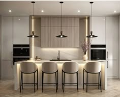 a modern kitchen with white cabinets and bar stools