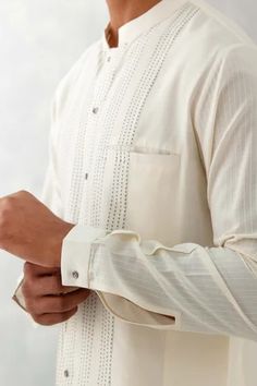 Shop for Devnaagri Ivory Cotton Silk Blend Thread Embroidered Kurta With Pant for Men Online at Aza Fashions Cotton Kurta With Embroidered Cuffs Long Sleeve, Cotton Kurta With Embroidered Cuffs, Cream Cotton Traditional Wear With Long Sleeves, Fitted Long Sleeve Kurta With Embroidered Cuffs, Cream Long Sleeve Cotton Traditional Wear, Cream Long Sleeve Set With Cutdana, Eid Long Sleeve Kurta With Embroidered Cuffs, Long Sleeve Kurta With Embroidered Cuffs For Eid, Off White Long Sleeve Kurta With Cutdana