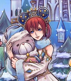 a woman holding a stuffed animal in front of a snow covered castle with trees and buildings