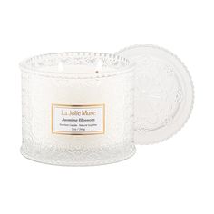 PRICES MAY VARY. JASMINE BLOSSOM - Our jasmine-scented candle embarks on a sensory garden stroll, where a bloom of fresh floral leads to a heart of rich jasmine and succulent fruits, grounded in the tranquility of a verdant green base. VEGAN SOY CANDLE - Our scented candle is poured with natural soy wax which is cruelty-free, paraben-free, and paraffin-free. This vegan candle guarantees a safe and delightful sensory experience. DOUBLE-WICK CANDLE - With a size of 12 oz/340 g and features 2 wicks that are made from lead-free cotton, this dual-wick luxury candle ensures a faster, more fragrant fill of larger spaces. Allowing for a clean and even burn for around 60 hours. DECORATIVE JAR CANDLE - Embossed delicate daisy patterns adorn a thick, luxury glass jar. The jar itself is a statement ho Jasmine Candle, Verdant Green, Jasmine Scent, Candle Gifts, Sensory Garden, Burning Candles, Luxury Candle, Vegan Candles, Glass Jar Candles