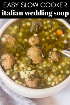 a bowl of italian wedding soup with meatballs in it and the title overlay reads easy slow cooker italian wedding soup