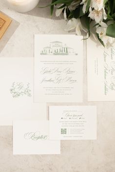 the wedding stationery is laid out and ready to be used