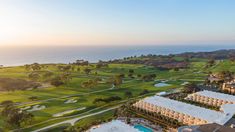 an aerial view of the resort and golf course