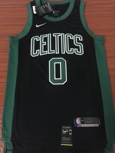 the jersey worn by boston's basketball team is on display