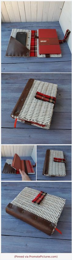 an open book with red ribbon on it and the pages folded in brown paper, sitting on top of a wooden floor