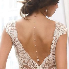 the back of a woman's wedding dress is seen on instagramm com