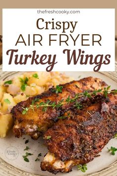 crispy air fryer turkey wings on a plate with potatoes