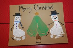 a christmas card with two snowmen and a tree on it's side, in front of a red background