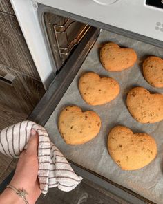 someone is baking cookies in the oven for valentine's day or other special occasion