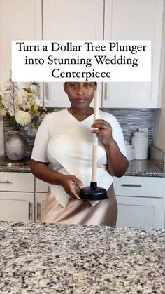 a woman standing in front of a counter with a sign on it that says turn a dollar tree plunger into stunning wedding centerpiece