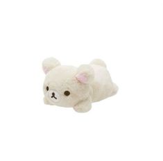 a small white stuffed animal laying down