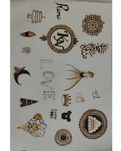 an assortment of stickers on the back of a refrigerator freezer that is covered in different designs