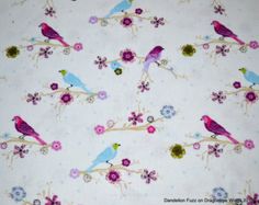 a white background with birds and flowers on it