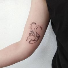 a person with a tattoo on their arm