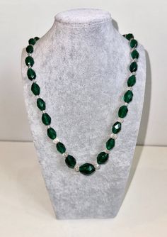 "From a private Atlanta collection, this gorgeous crystal beaded necklace consists of about of 28\" of beads. They're graduated and alternating with faceted and oval emerald green crystal beats and small round faceted clear spacers. The necklace is nicely strung though it is not knotted; it's long enough to go over the head and was made without a clasp. It feels pretty symmetrical with a nice center focal bead that's approximately 3/4 of an inch long. I would estimate these are quite likely Aust Green Crystal Necklace, Emerald Green Crystal, Crystal Beaded Necklace, Crystal Bead Necklace, Oval Beads, Green Crystal, Focal Bead, Green Crystals, Bead Strand