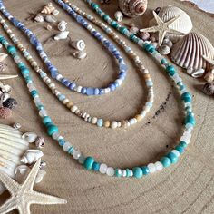 Beaded necklaces with a summery, beachy, seaside vibe! Not your average beaded necklace, these designs consist of a multitude of beads, in varying sizes, shapes and complimentary tones. I use glass, ceramic, stone and gemstone beads in my necklaces, each design will feature a variety of these.  Style One: teal and aqua, very ocean colour vibes! Style Two: seashore sands, with added touches of baby blue sky Style Three: Blue skies, perfect summer weather! Check out my other listings for more colo Beach Shade, Color Vibe, Ocean Colors, Summer Weather, Summer Necklace, Blue Skies, Glass Ceramic, Beaded Necklaces, Perfect Summer