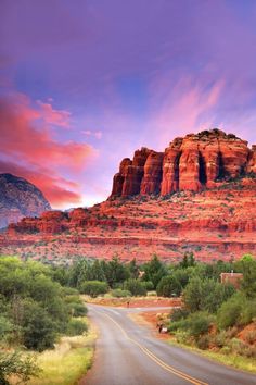 a scenic view of the red rocks and mountains in sedona, arizona at sunset