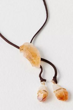 Stunning powerful mixed media necklace. This style is so cool and easy to wear. Lovely healing crystal on leather wrapped with brass to pull up and down to your fancy. This necklace is super bohemian and has a fresh aesthetic. Hand wrapped rough crystals in a lovely silhouette. Citrine is a powerful healing crystal for joy and abundance. Citrine connects to your solar plexus chakra for self will, esteem and confidence. Wearing citrine is like having sunshine with you to add a bright cheerful ene Raw Crystal Pendant, Fresh Aesthetic, Mixed Media Necklace, Bolo Necklace, Thunder And Lightning, Wire Wrapping Crystals, Rough Crystal, Solar Plexus Chakra, Bolo Tie