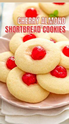 cherry almond shortbread cookies on a plate with the words cherry almond shortbread cookies