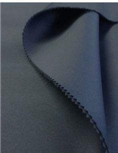 a close up view of a blue fabric