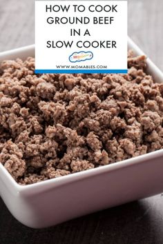 slow cooker ground beef in a white bowl on a wooden table with text overlay