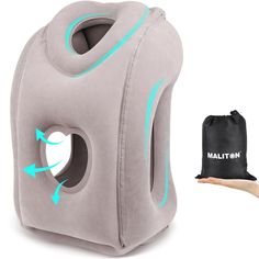 an inflatable travel pillow with a drawstring bag next to it and a hand holding the pouch