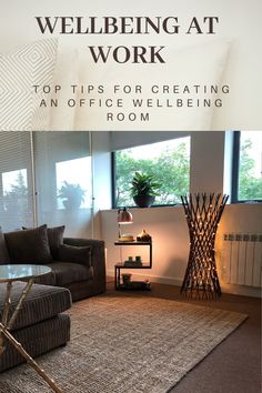 a living room filled with furniture next to a window and a rug on the floor